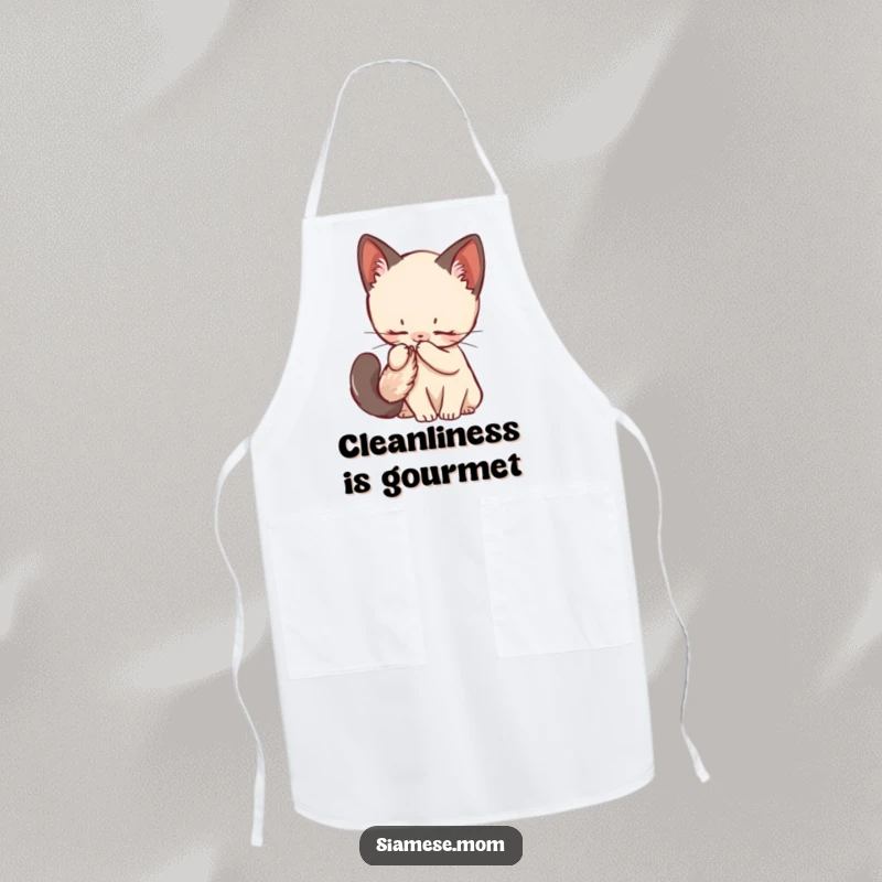 Funny Siamese Kitten Apron featuring a kawaii cat grooming its fluffy tail, ready for tidy kitchen adventures.