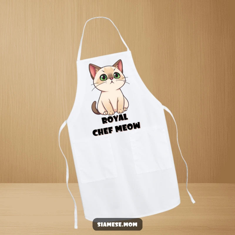 Funny Apron showing a kawaii Siamese cat with a regal air, perfect for cooks who appreciate feline majesty and kitchen command humorously.