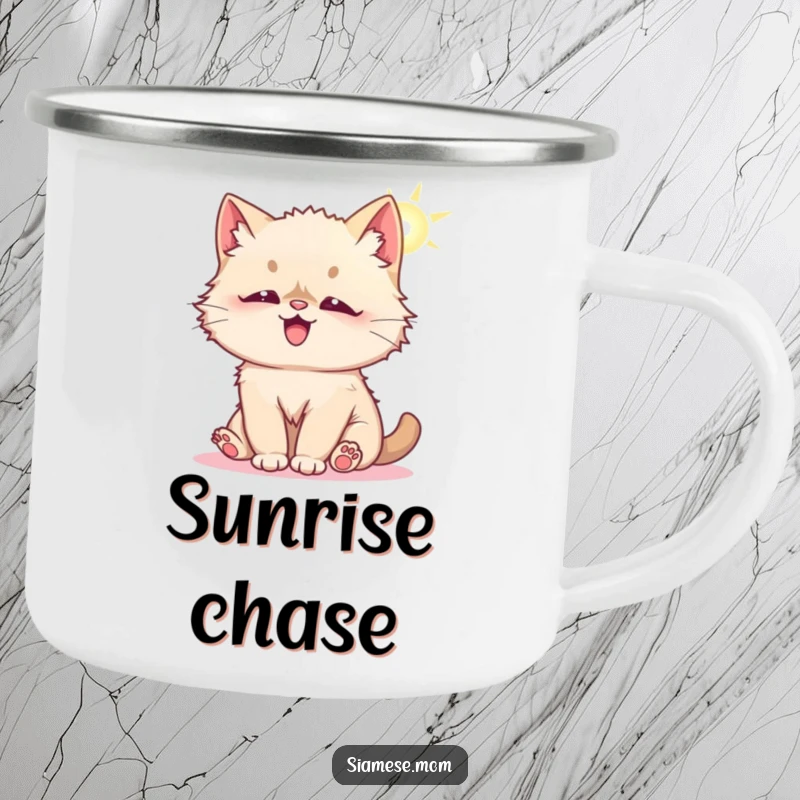 Funny camping mug with a fluffy Kawaii Siamese cat playfully batting at a sunbeam, perfect for outdoor use and adding a cute touch.
