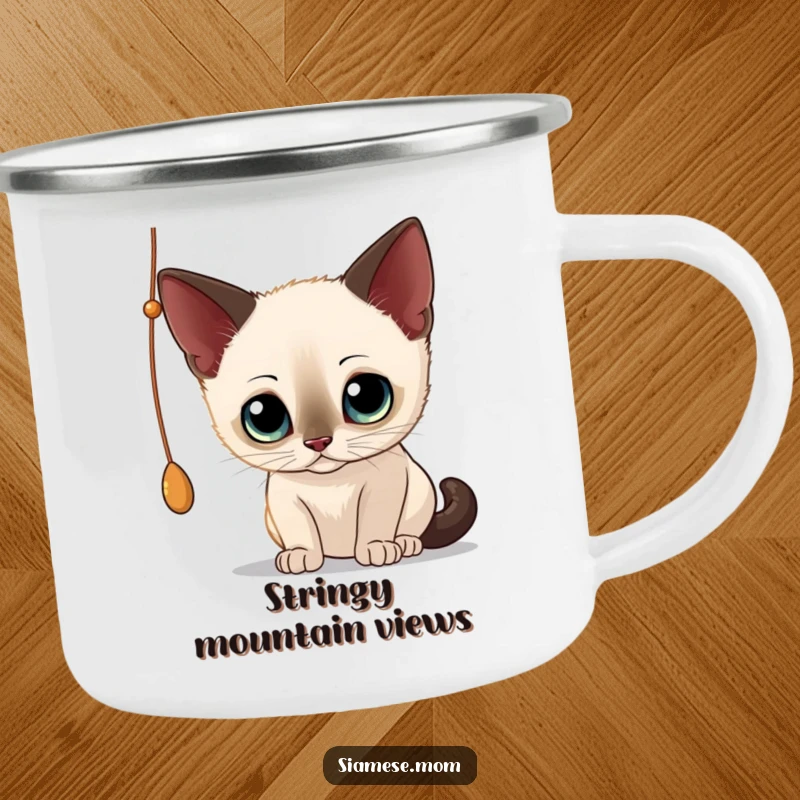 Funny Siamese Cat Camping Mug: Sturdy mug with a curious cat batting at a string, ready for outdoor fun.