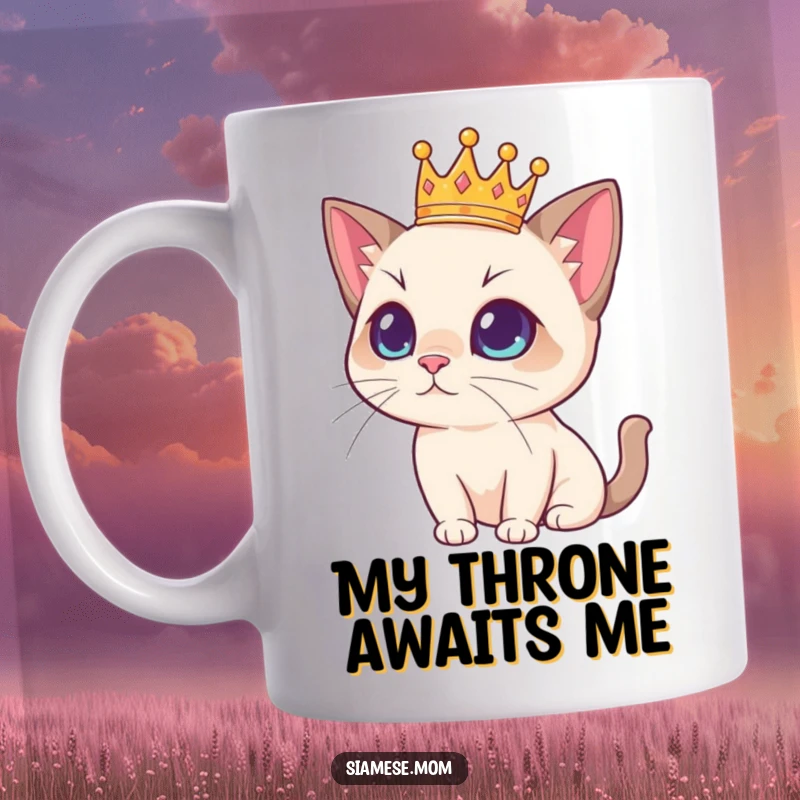 Funny Siamese cat wearing a tiny golden crown, looking regal and slightly amused on a coffee mug, perfect for cat enthusiasts.