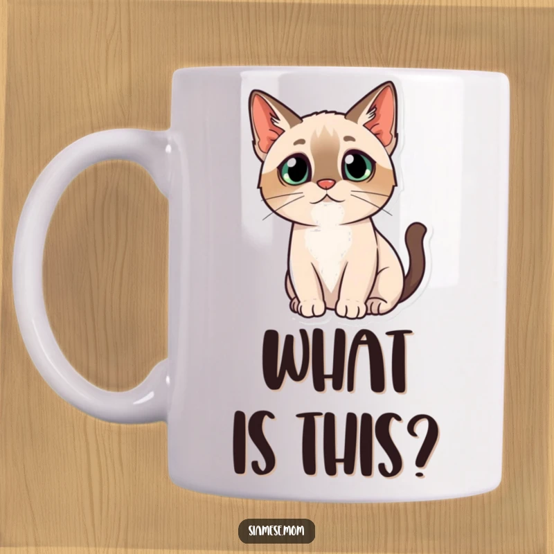 Funny kawaii Siamese cat mug depicting the feline with a curious head tilt, looking questioning and adorable.