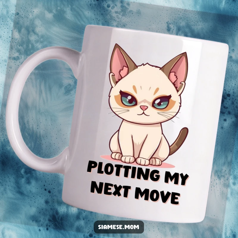 Mischievous Siamese cat mug, with a playful twinkle in its eye, suggesting impending feline mischief and fun.