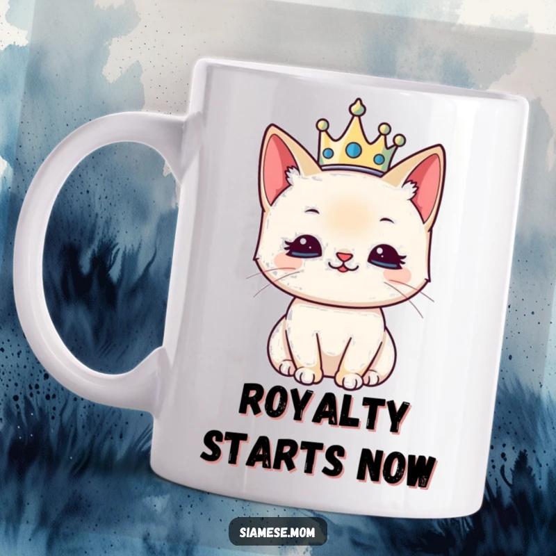 Funny kawaii Siamese cat mug depicting the feline wearing a tiny crown with a regal, pleased expression.