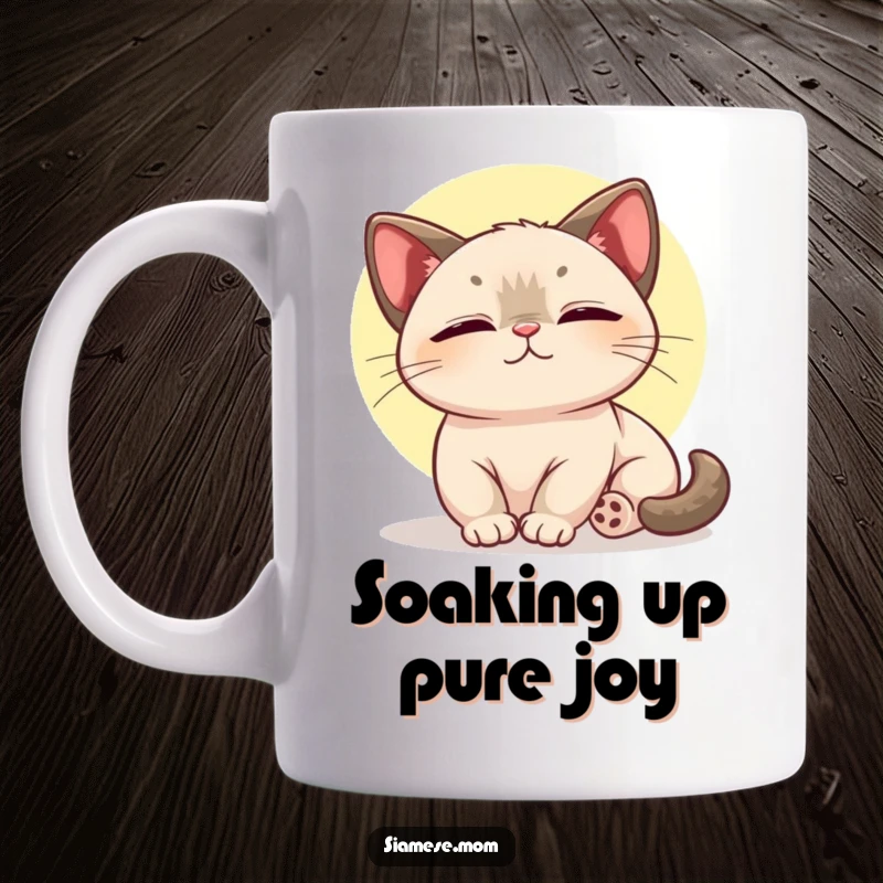 Funny kawaii Siamese cat mug depicting the feline basking in a sunbeam with a blissful, contented expression.