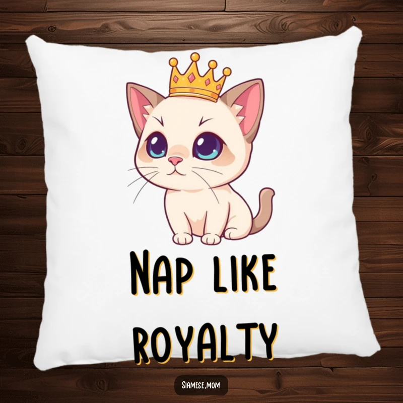 Funny Siamese cat design wearing a small crown, looking regal and cute on a soft throw pillow, a humorous home decor item.