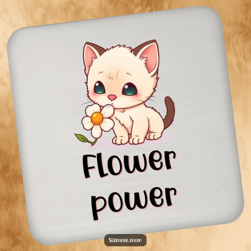 Funny Drink Coaster: A close-up of a kawaii Siamese kitten's face as it curiously sniffs a vibrant tulip.