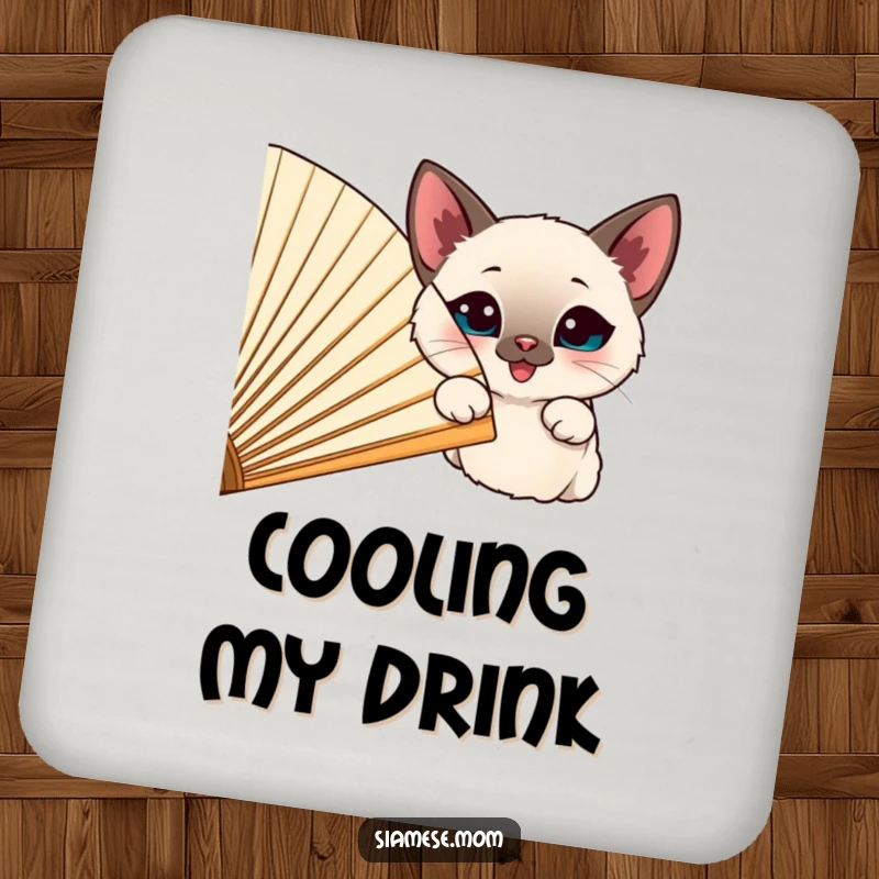 Funny happy Siamese cat peeking from behind a large, cheerful fan, on a protective and decorative drink coaster.