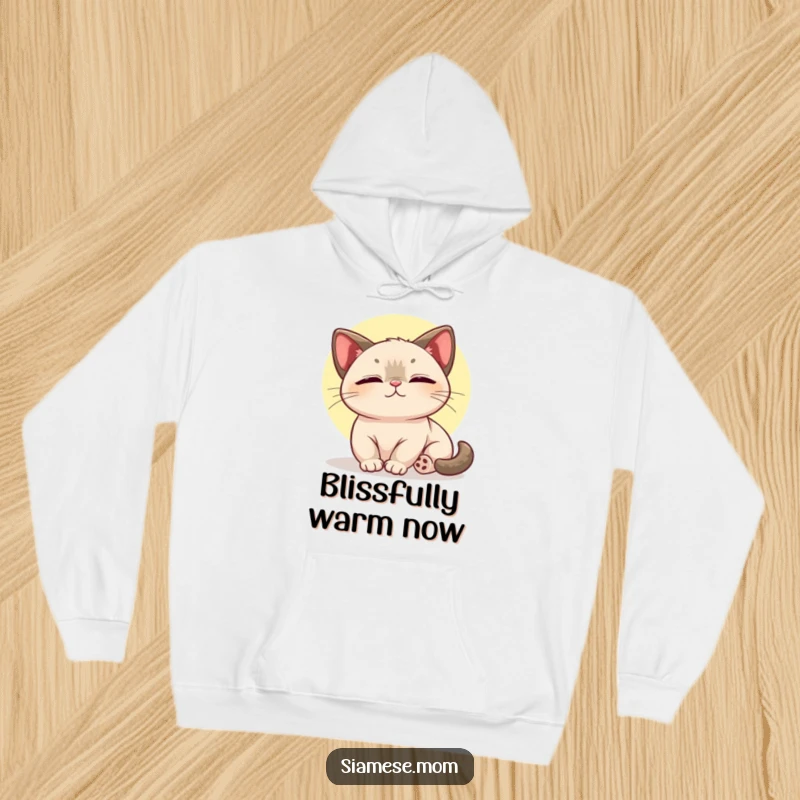 Funny hoodie featuring a kawaii Siamese cat radiating happiness while lounging in a cozy sunbeam.