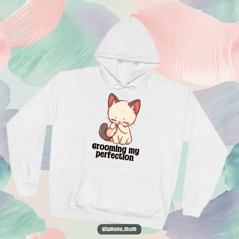 Funny Siamese Kitten Hoodie designed for comfort, featuring a kawaii cat grooming its fluffy tail with adorable focus.