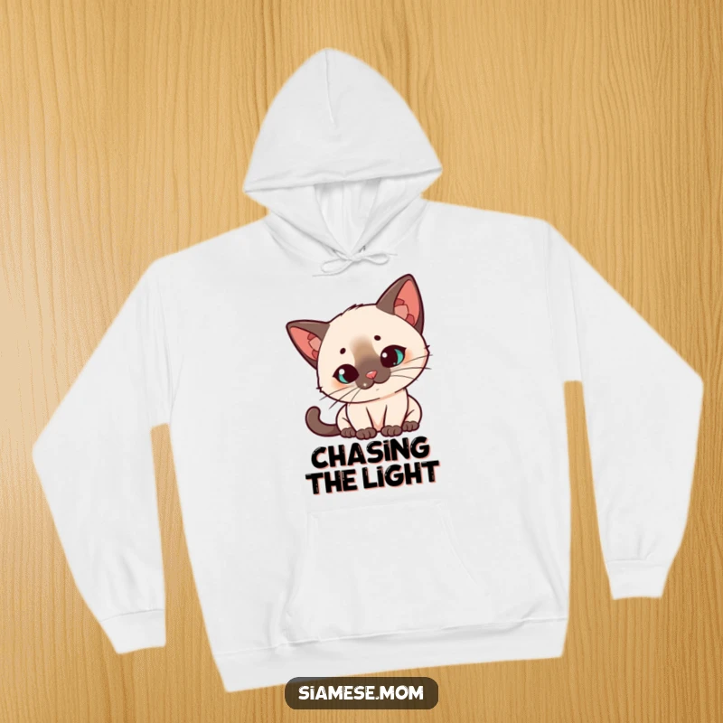 Funny Kawaii Siamese cat hoodie, quizzical head tilt, intensely watching a red laser dot, a cozy and humorous apparel choice.