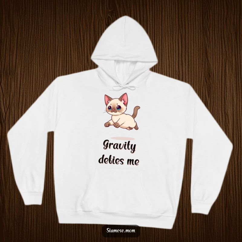 Funny Kawaii Siamese cat hoodie featuring a graceful leap with tucked legs, offering cozy comfort and a touch of dynamic humor.
