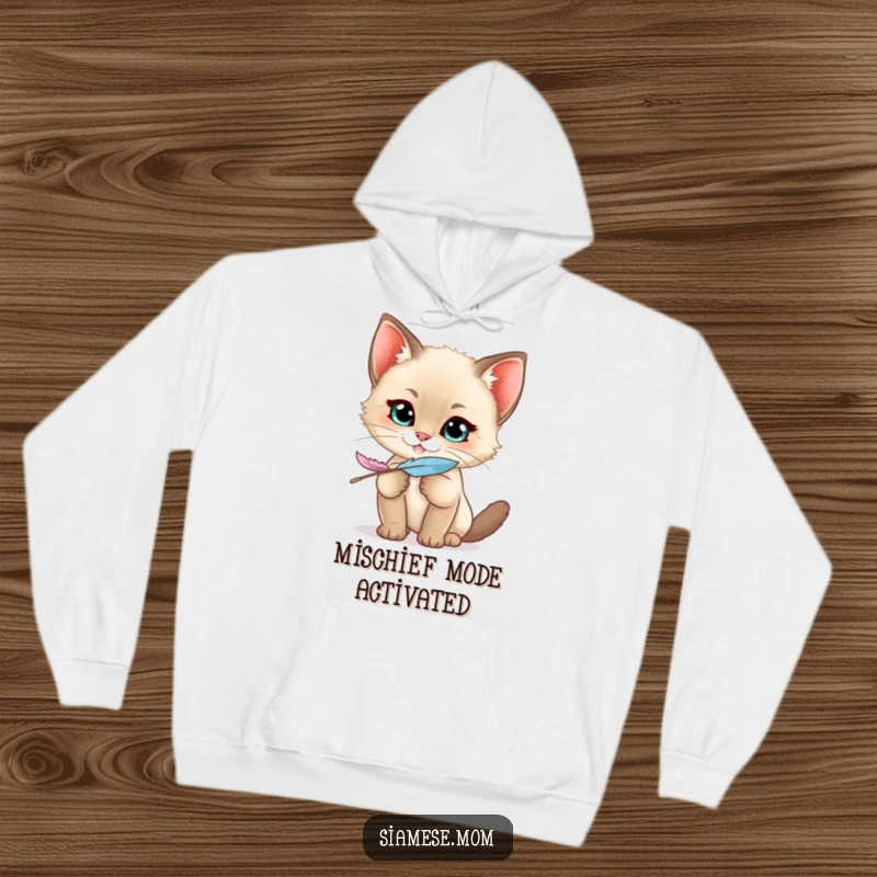 Funny Siamese Kitten Hoodie showcasing a kawaii cat with a mischievous grin holding a feather, perfect for cozy, playful moments.