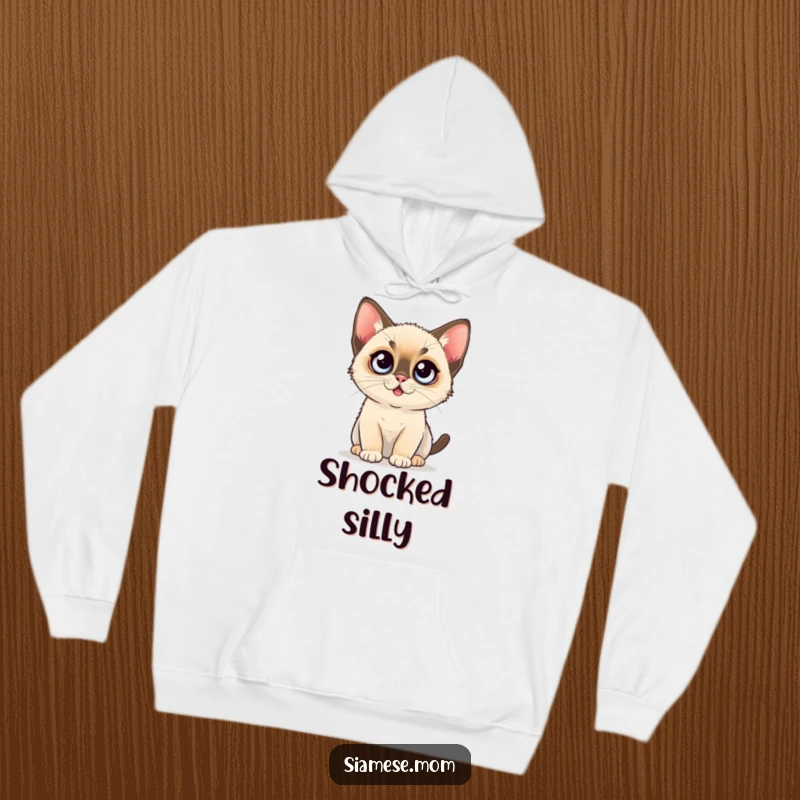 Funny Hoodie: A kawaii Siamese kitten with cartoonishly large, wide-open eyes, conveying utter shock.
