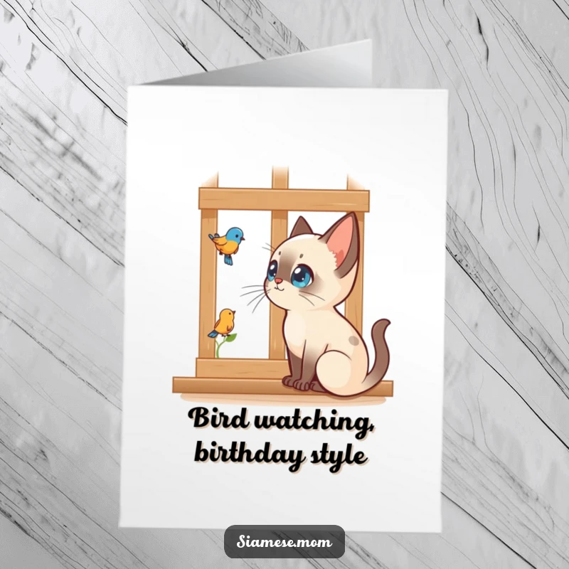 Funny Free Printable Birthday Card: Kawaii Siamese cat intently watching a bird outside a window, mesmerized gaze.