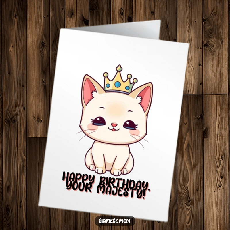Funny Free Printable Kawaii Siamese Cat Birthday Card with a tiny crown, looking regal and pleased, a downloadable gift.