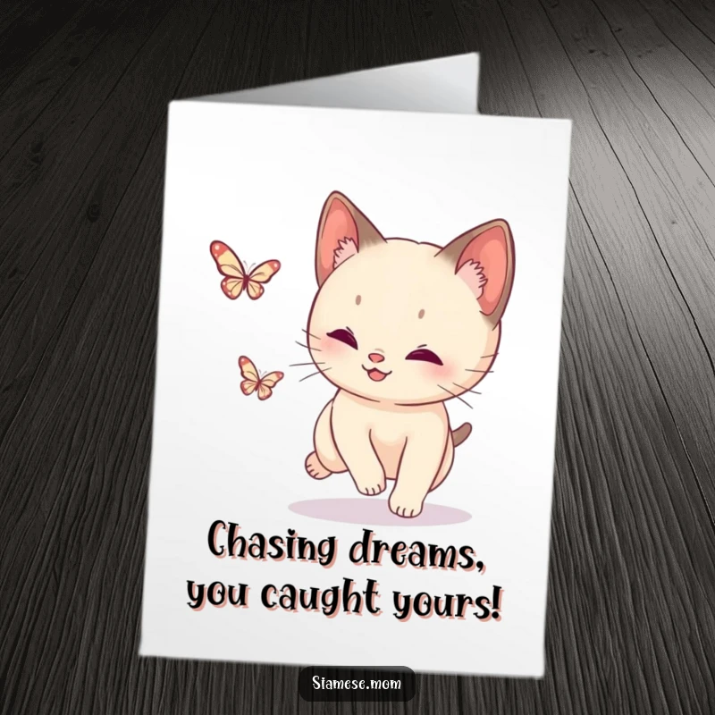 Funny Free Printable Congratulations Card: A Siamese cat energetically chasing a small, shimmering butterfly.