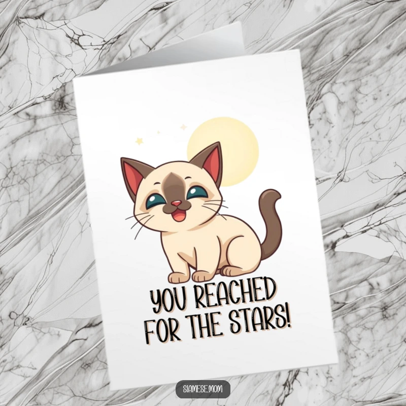 Funny Free Printable Congratulations Card: a happy Siamese cat playfully bats at enchanting moonbeams, celebrating success.
