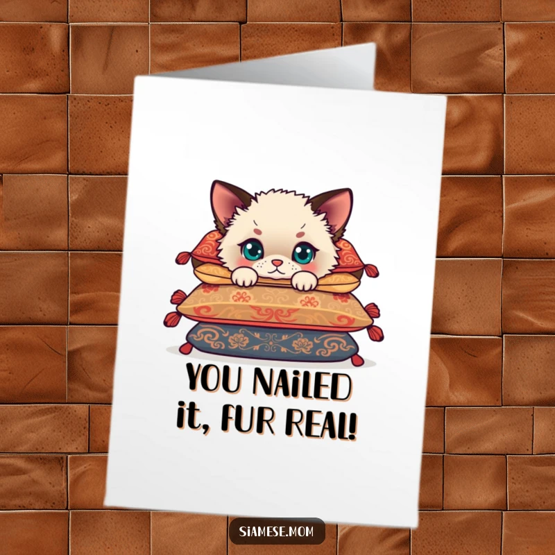 Free Printable Congratulations card with a cute Siamese cub hiding behind cushions, celebrating success.