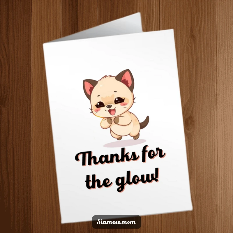 Free Printable Thank You card showing a giggling Siamese cub enthusiastically chasing a shimmering light beam in thanks.