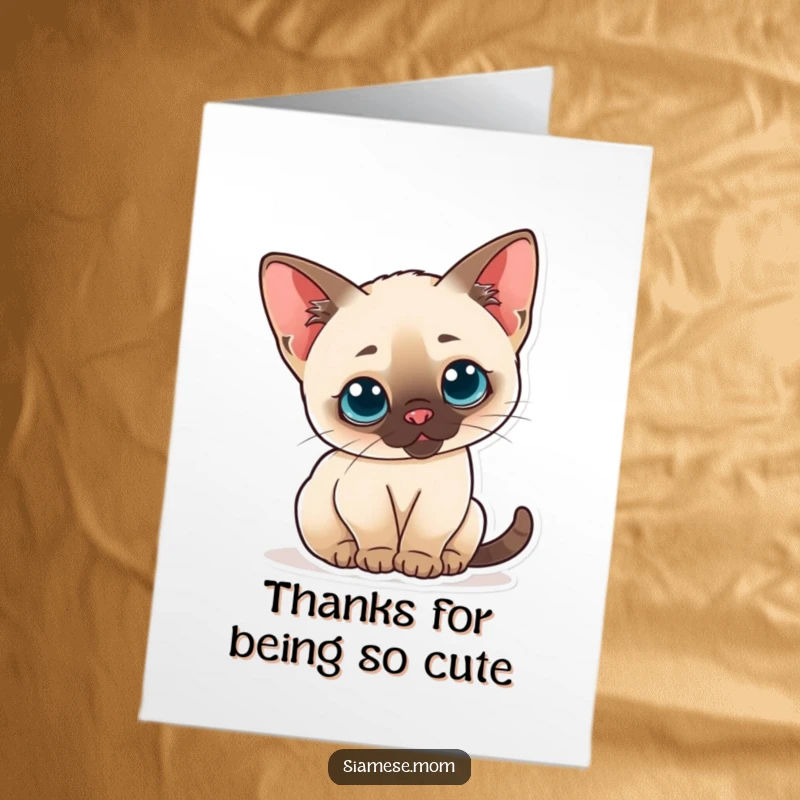Funny Free Printable Thank You Card: A Kawaii Siamese cat with perked ears, looking curious and expressing thanks.