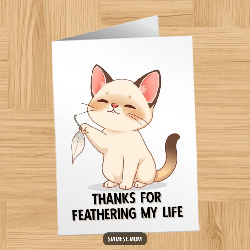 Funny Free Printable Thank You Card: A Siamese cat is captivated by a slowly falling feather, a whimsical thank you.