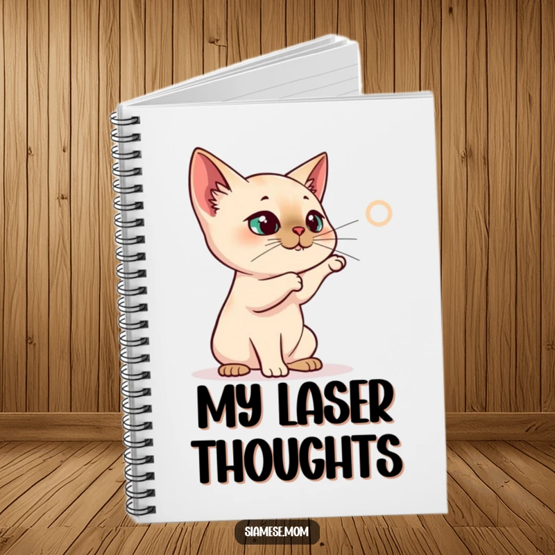 Funny Siamese Cat Notebook, cat batting at a projected laser dot, focused and funny gift for writers.