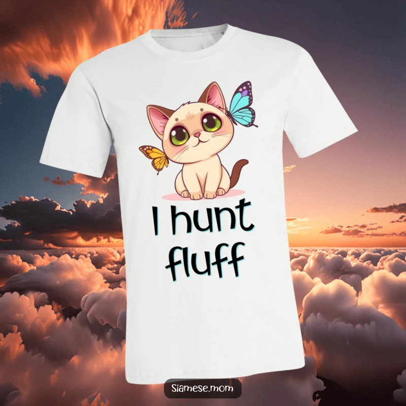 Funny Kawaii Siamese cat t-shirt showing a cute cat with big eyes reaching for a butterfly, a scene of innocent fun.