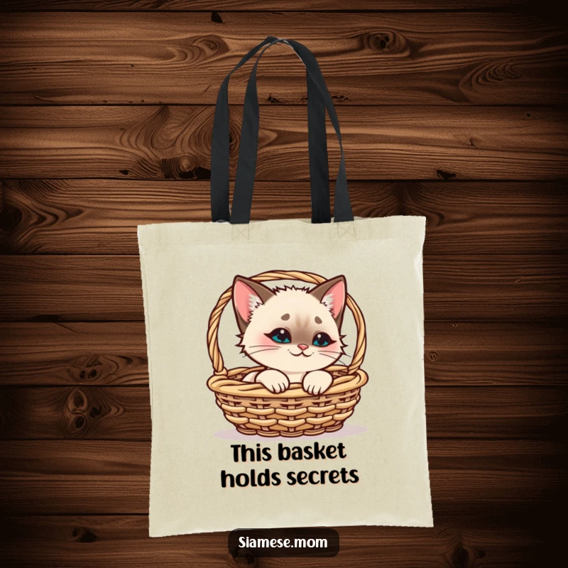 Funny Kawaii Siamese Cat Tote Bag with a playful smirk, peeking from a basket, perfect for a funny gift.