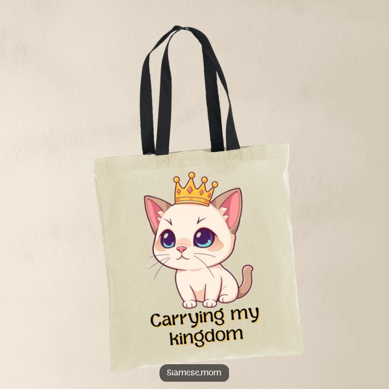 Funny Siamese cat graphic with a small crown, looking regal and stylish on a durable tote bag, a humorous accessory.