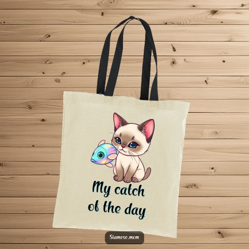 Funny Siamese Cat Tote Bag, elegant cat batting at a holographic fish, stylish and funny gift for shoppers.